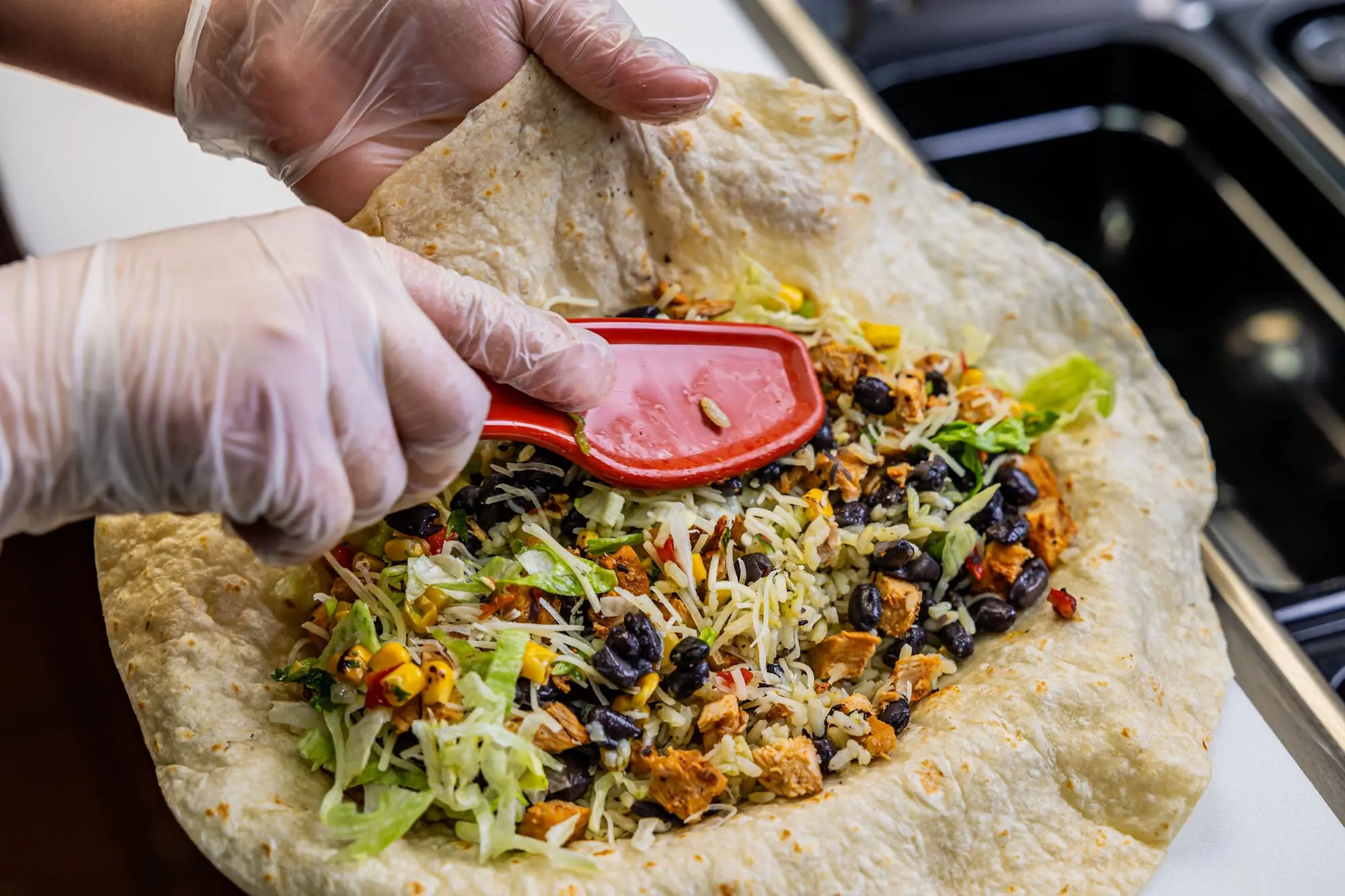 Bob the Tool mixing Pancheros burrito ingredients
