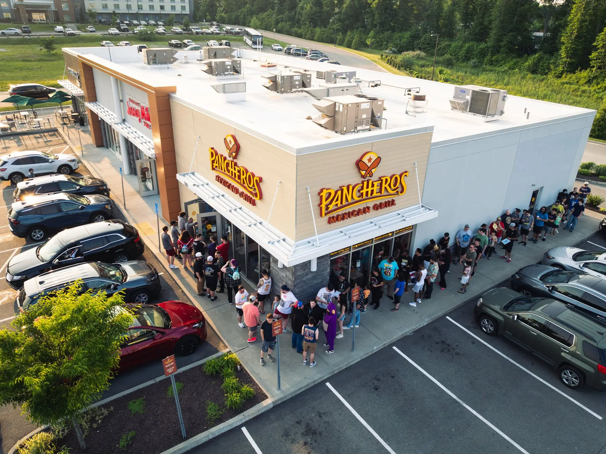 Line of people wrapped around the Pancheros Somerset MA location